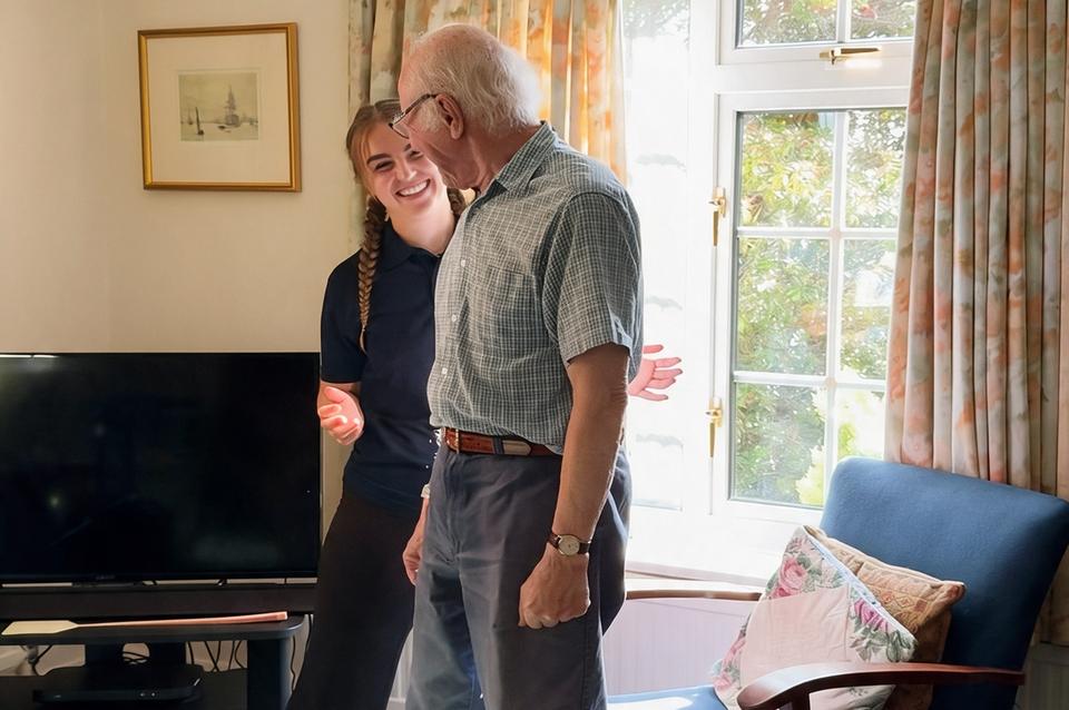 Standing practice in the living room after a hospital stay
